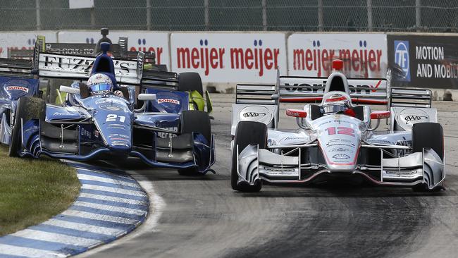 Will Power took a fighting victory in Dual in Detroit Race 2.