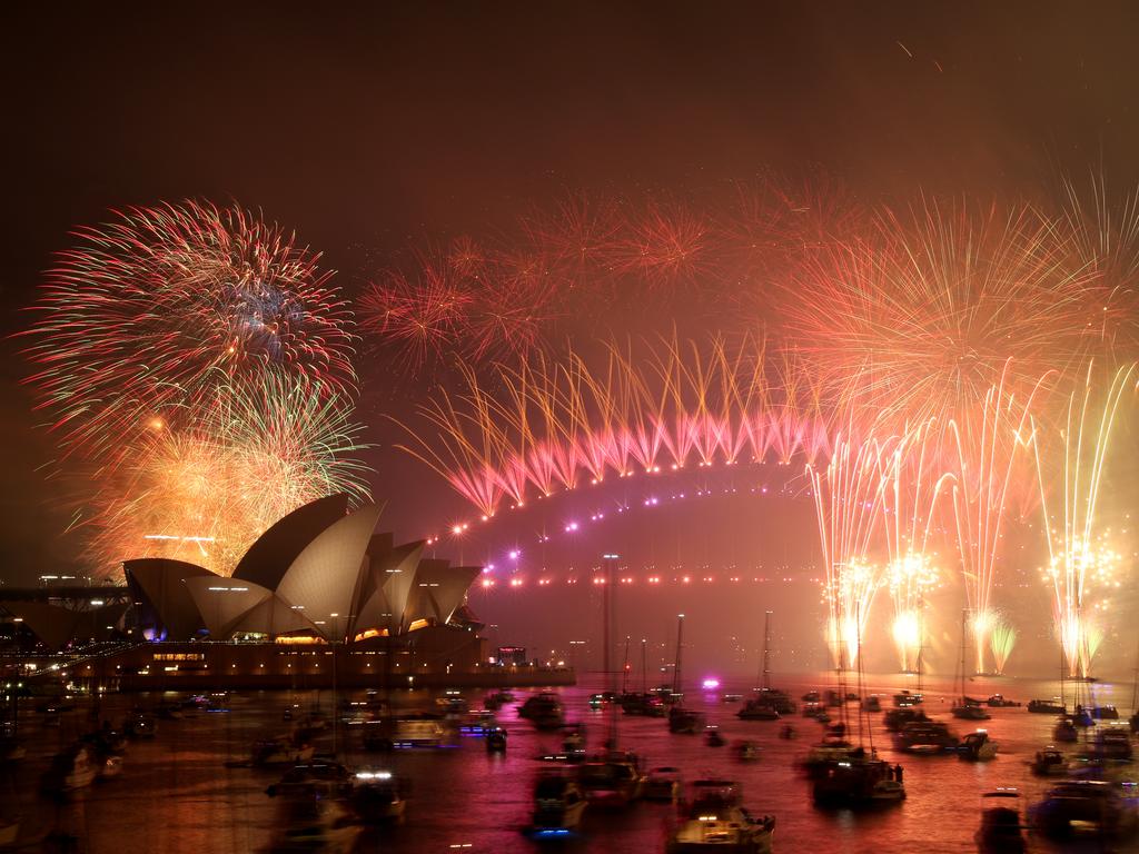 New Year's Eve midnight fireworks over Sydney Harbour as seen from Mrs Macquarie's Chair. Picture: Jonathan Ng