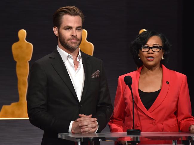 BEVERLY HILLS, CA - JANUARY 15: Actor Chris Pine (L) and Academy President Cheryl Boone Isaacs take the podium to announce the nominees for the 87th Academy Awards Nominations Announcement at the AMPAS Samuel Goldwyn Theater on January 15, 2015 in Beverly Hills, California. (Photo by Kevin Winter/Getty Images)