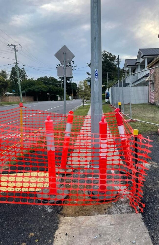 The light pole in the middle of the footpath in Yeronga, which a Council committee heard at May 28's meeting was "not finished yet''. Picture: Facebook/Nicole Johnston