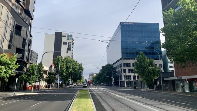 A deserted King William St, city, at 8.15am on day one of lockdown. Picture: Tricia Watkinson