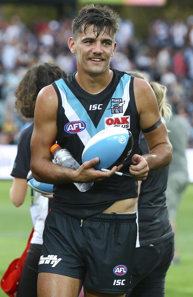 Port Adelaide’s Riley Bonner is all smiles after the victory. Picture: SARAH REED