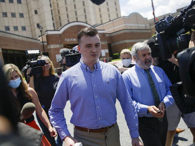 Former Atlanta Police officer Devin Brosnan is surrounded by media following his release from the Fulton County Jail. Picture: AP