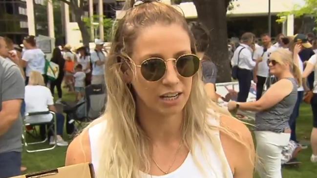 Adelaide AFLW player Deni Varnhagen at a protest against mandatory Covid vaccinations for SA Heath workers. Picture: 7 NEWS