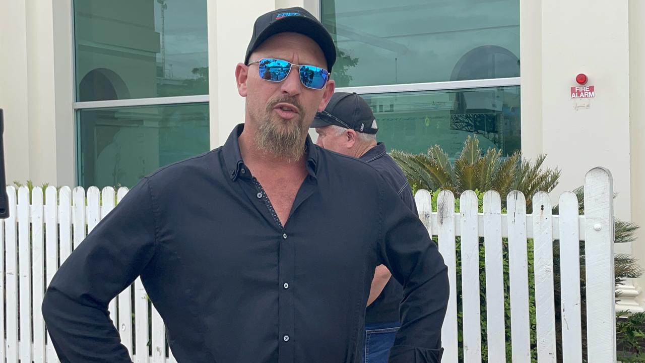 Supporters who labelled themselves as close relatives of victims Mervyn and Maree Schwarz and Graham Tighe speak to media outside Bowen courthouse after accused murderer Darryl Valroy Young appears over videolink for a mention. Picture: Janessa Ekert