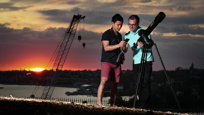 Saber Astronautics director Andreas Antoniades, right, with Dan Lim at Sydney Observatory. Picture: Ryan Osland