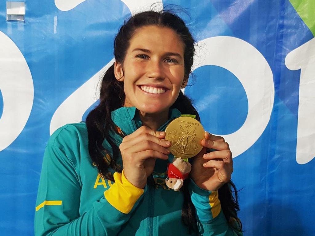 Twitter image of Sevens Rugby player Charlotte Caslick with her gold medal.