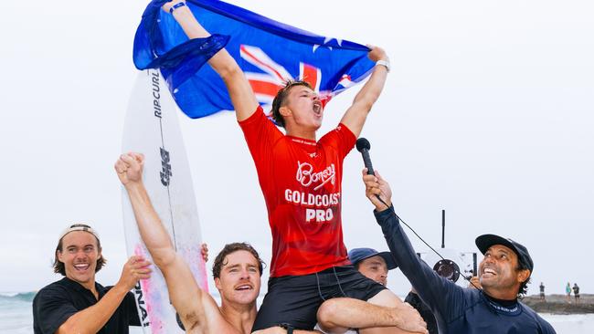 Friends help Mikey McDonagh of Australia celebrate winning the Final of the Bonsoy Gold Coast Pro at Snapper Rocks on Saturday. Picture: Cait Miers/World Surf League