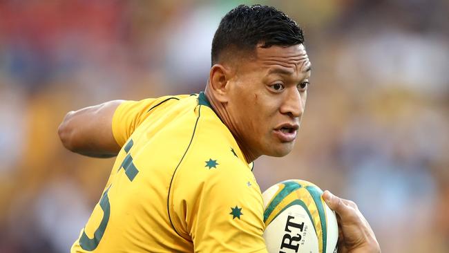 BRISBANE, AUSTRALIA - JUNE 24:  Israel Folau of the Wallabies is tackled during the International Test match between the Australian Wallabies and Italy at Suncorp Stadium on June 24, 2017 in Brisbane, Australia.  (Photo by Mark Kolbe/Getty Images)