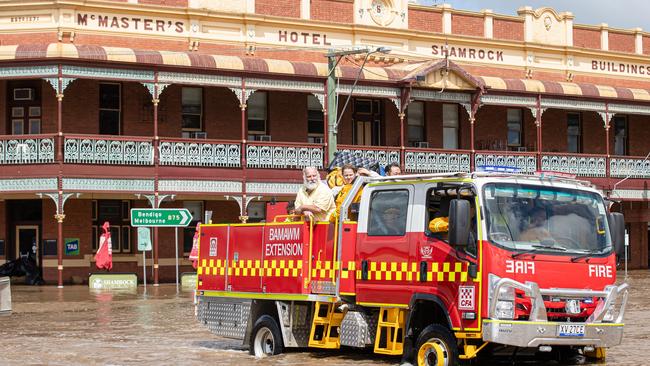 CFA trucks rescue residents in Rochester as the Campaspe River rises. Picture: Jason Edwards