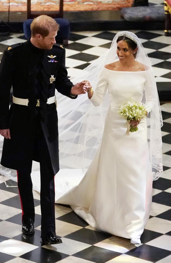 Just married. (Owen Humphreys/pool photo via AP)