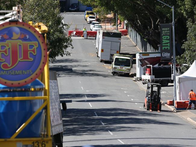 Workers pack up as the Ekka Show was cancelled due to the lockdown. Picture: Zak Simmonds