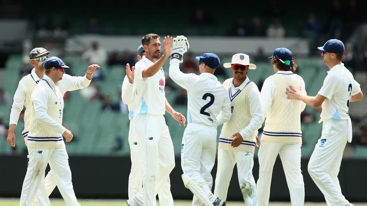 Mitchell Starc (C) of New South Wales celebrates the wicket of Marcus Harris of Victoria. Picture: Robert Prezioso/Getty Images