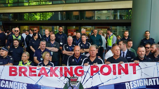 Officers outside Victoria Police HQ on Spencer St. Picture: NewsWire / Luis Enrique Ascui