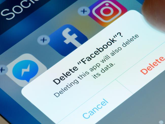 Antibes, France - February 21, 2018: User deletes Facebook app from iPhone. The social media platform faces increased scrutiny around personal data privacy and its handing of fake news and extremist content.