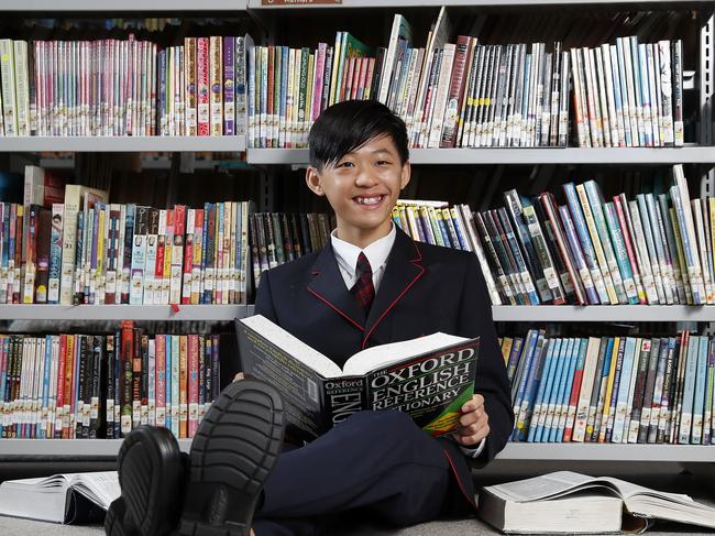 National winner of the Prime Minister's Spelling Bee competition Evan Luc-Tran asked the Prime Minister to spell leukocyte. Picture: Toby Zerna