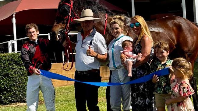 Brendon Newport (left) and Sarah Robbins (third from left) lost their riding gear when a fire destroyed their mobile home.