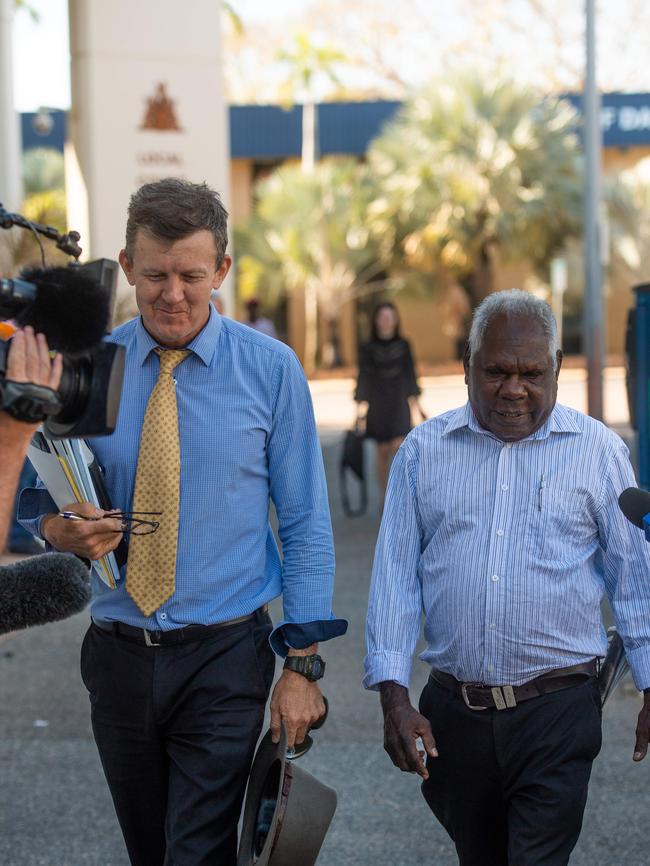 Country Liberal Party candidate for Arafura Gibson Farmer Illortaminni leaves court after facing drink driving chargers in Darwin Local Court, with his lawyer Peter Maley.