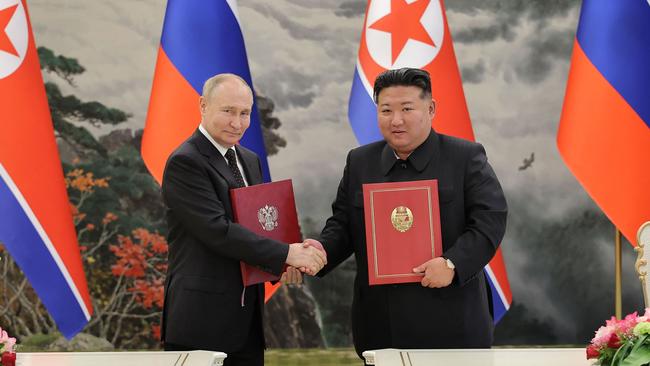 Kim Jong-un and Vladimir Putin after a signing ceremony following bilateral talks at the Kumsusan State Guesthouse in Pyongyang. Picture: AFP.