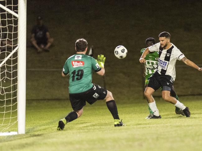 Willowburn player Nathan Daly (right) and keeper Jayden Richardson defend a strike from Ferdinand Annor of Southport SC in FFA Cup Football Queensland round three at Commonwealth Oval, Saturday, February 20, 2021. Picture: Kevin Farmer