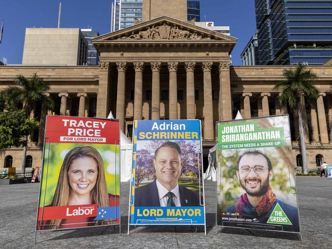 Posters for Lord Mayoral candidates Tracey Price, Adrian Schrinner and Jonathan Sriranganathan at early voting for the Brisbane City Council Election at Brisbane City Hall, Monday, March 4, 2024 - Picture: Richard Walker