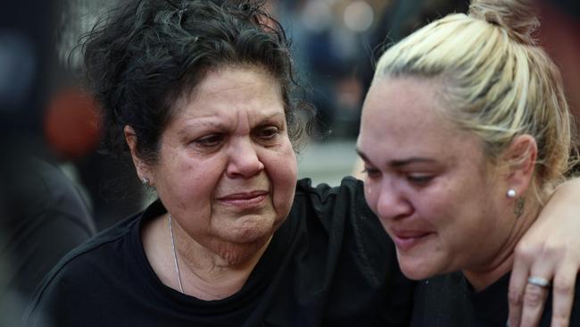 Mother of Cassius Turvey, Mechelle (left) embraces Emily Farmer during a rally for her son in November 2022. Picture: Matt Jelonek/Getty Images