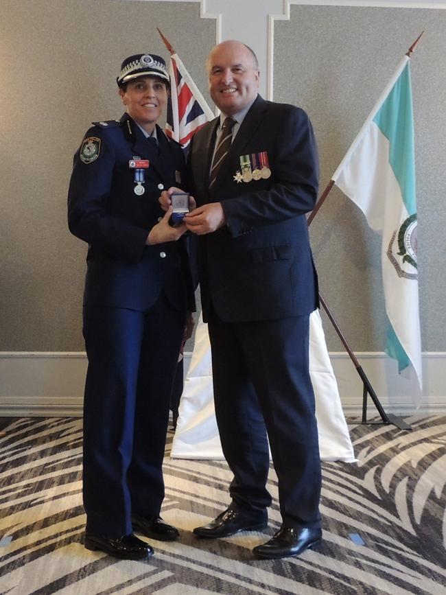 PInspector Helen Dean recieving a NSW Police Medal 20 year clasp from Baulkham Hills state Liberal MP David Elliott