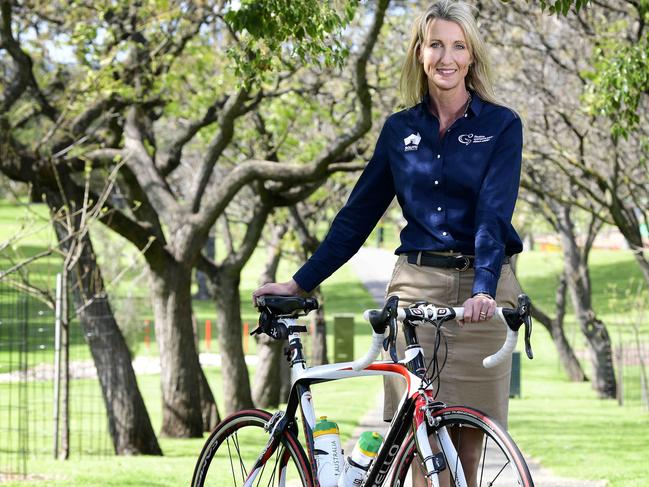 Tour Down Under women's race director Kimberley Conte poses with her bike at Rymill Park, Adelaide, Saturday, September 8th, 2018. Kimberley reveals the 2019 Tour Down Under women's race route today. (AAP Image / Bianca De Marchi)