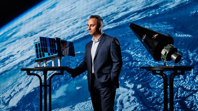 Enrico Palermo, head of Australian Space Agency with a satellite at the Lab. Picture Matt Turner.