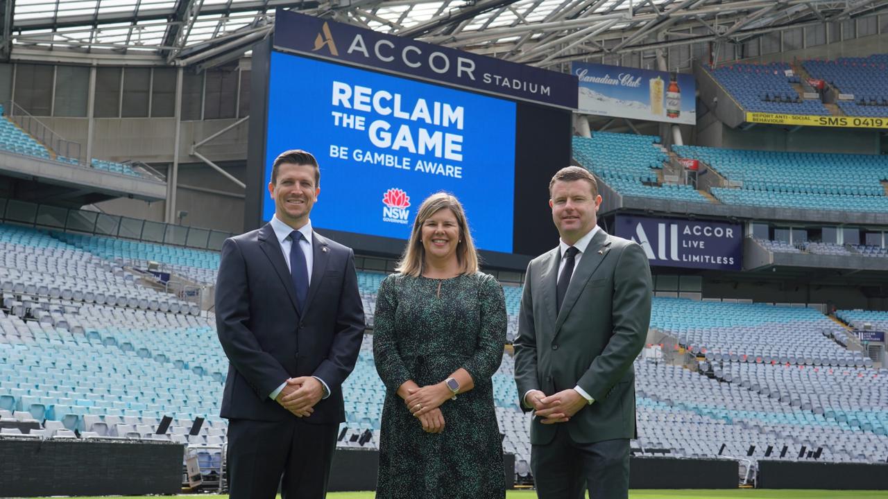 Bulldogs CEO Aaron Warburton and Rabbitohs CEO Blake Solly with Natalie Wright, the director of the Office of Responsible Gambling, at the Reclaim the Game Announcement at Accor Stadium.