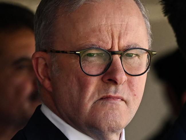 Australia Prime Minister Anthony Albanese (C) along with Industry and Science Minister Ed Husic (L) and New South Wales premier Chris Minns attend the funeral of Pakistani security guard Faraz Tahir at Baitul Huda mosque in Sydney on April 26, 2024. Pakistani security guard Faraz Tahir was one of the six victims killed at Westfield Bondi Junction on April 13, 2024 in a mass stabbing attack. (Photo by Saeed KHAN / AFP)