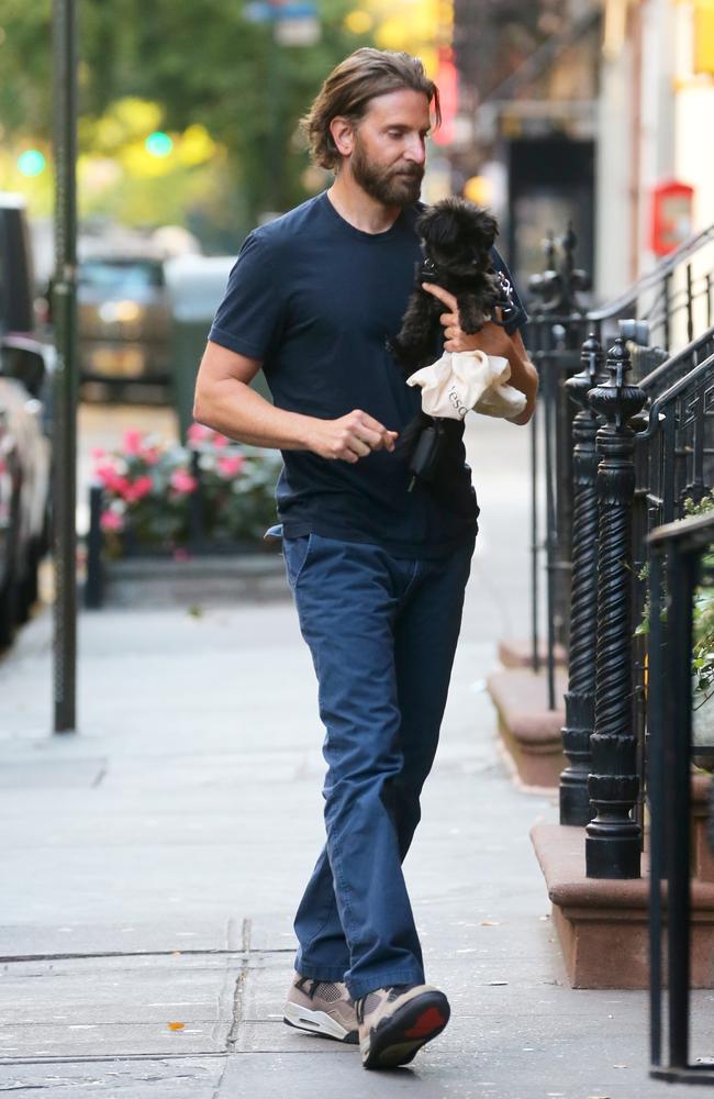 Bradley Cooper was photographed arriving at ex Irina Shayk’s apartment to return their dog, who they share custody of. Picture: Splash/Backgrid