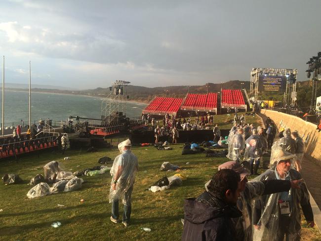 Organisers directed Anzac Day pilgrims to take cover at nearby security tents. Picture: Picture: Ella Pellegrini