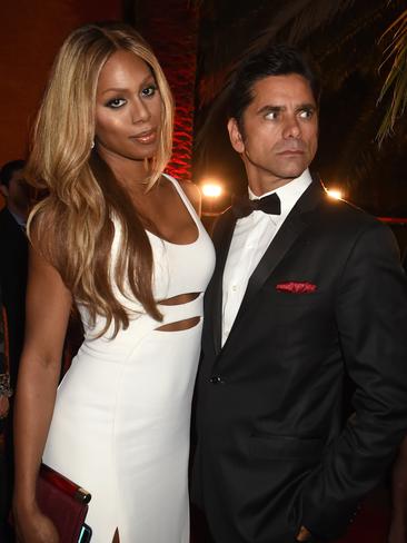 Orange is the New Black’s Laverne Cox and John Stamos attend HBO’s Official 2015 Emmy After Party. Picture: Jeff Kravitz/FilmMagic