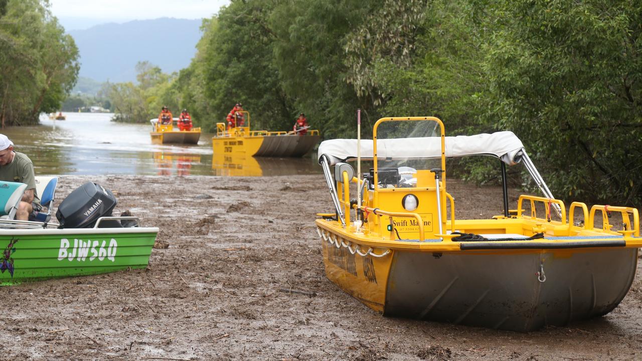 SES boats muster at the end of Wisteria St in Holloways Beach. Picture: Peter Carruthers