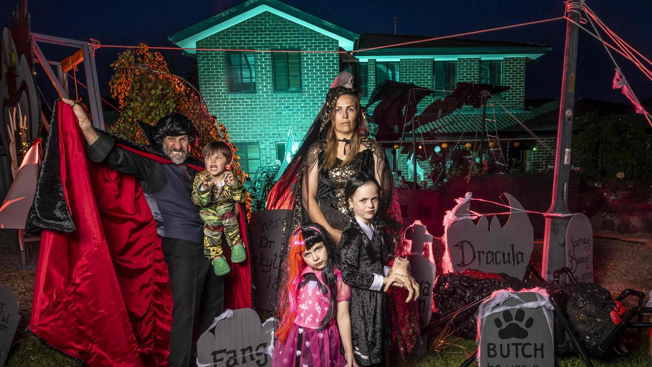 Amedeo Gallicchio and Jess Louchard with kids Sofia 7, Lucia 6 and Valentino 3 at the front of their Halloween House 2024. Photo: Wayne Taylor