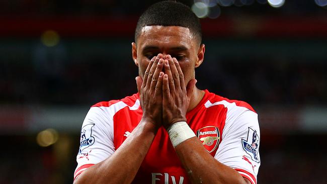 LONDON, ENGLAND - SEPTEMBER 27: Alex Oxlade-Chamberlain of Arsenal reacts after a missed opportunity during the Barclays Premier League match between Arsenal and Tottenham Hotspur at Emirates Stadium on September 27, 2014 in London, England. (Photo by Paul Gilham/Getty Images)