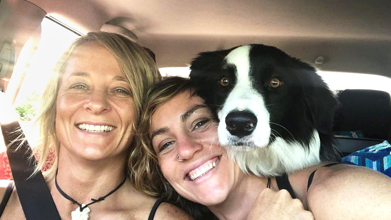 Firefighter Izabella Nash with partner Bec Weinert and dog Billy.