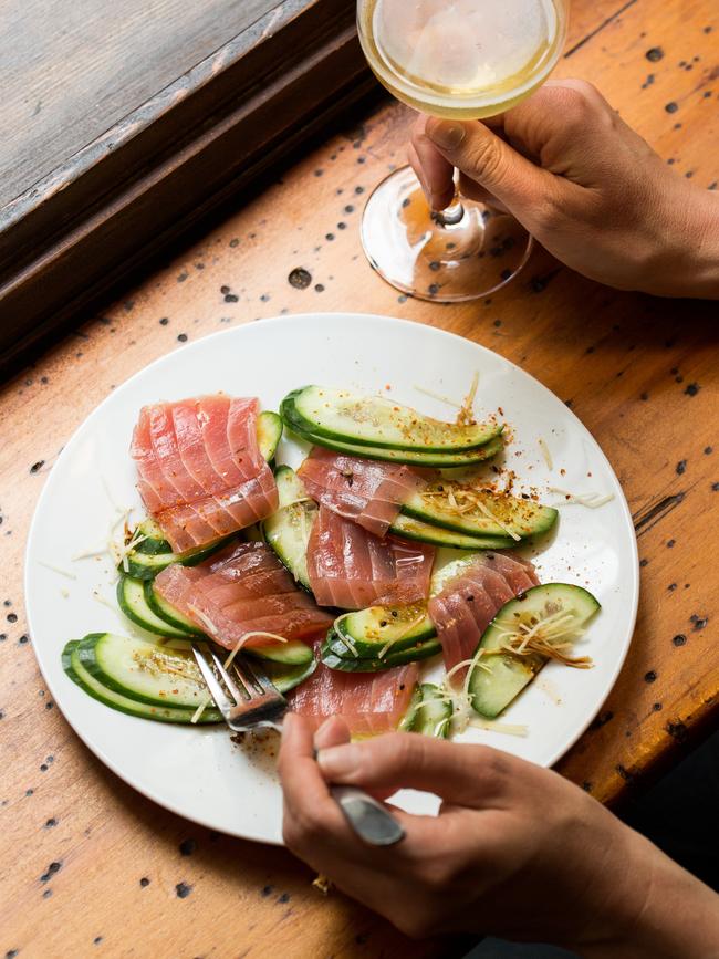 Salmon and cucumber with a cocktail. Picture: Trent Van Der Jagt