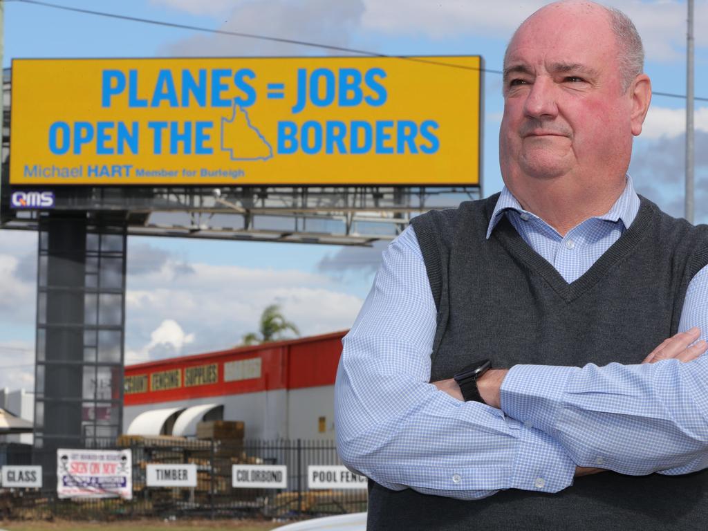 Michael Hart MP unveils a new billboard campaign calling on Labor to end the border shambles and get more flights into the Gold Coast. Picture Glenn Hampson