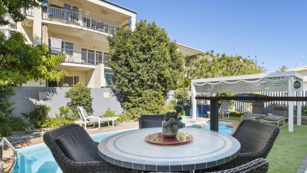 The owner of 32 Pine Ave, Surfers Paradise, took on his neighbours because of overhanging trees.