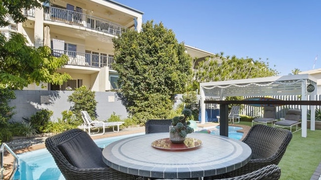 The owner of 32 Pine Ave, Surfers Paradise, took on his neighbours because of overhanging trees.