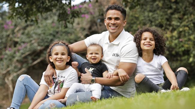 Former Olympian and SAS contestant John Steffensen with his three kids (from left): Lola, 8, Wolff, eight months, and Rusty, 6. Picture: Sam Ruttyn