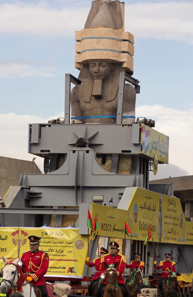 The famous statue of the ancient Egyptian pharaoh is surrounded by honour guards as it is relocated. Picture: AP Photo/Amr Nabil