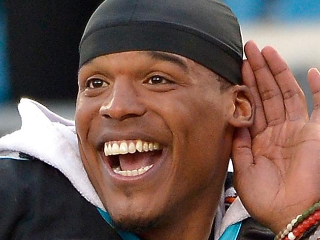 CHARLOTTE, NC - DECEMBER 13: Cam Newton #1 of the Carolina Panthers listens to the fans cheer during the final seconds of a win against the Atlanta Falcons at Bank of America Stadium on December 13, 2015 in Charlotte, North Carolina. The Panthers won 38-0. Grant Halverson/Getty Images/AFP == FOR NEWSPAPERS, INTERNET, TELCOS & TELEVISION USE ONLY ==