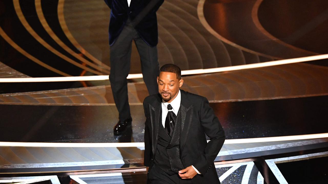 Will Smith walks away after slapping Chris Rock on stage at the Oscars on March 27. Picture: Robyn Beck/AFP