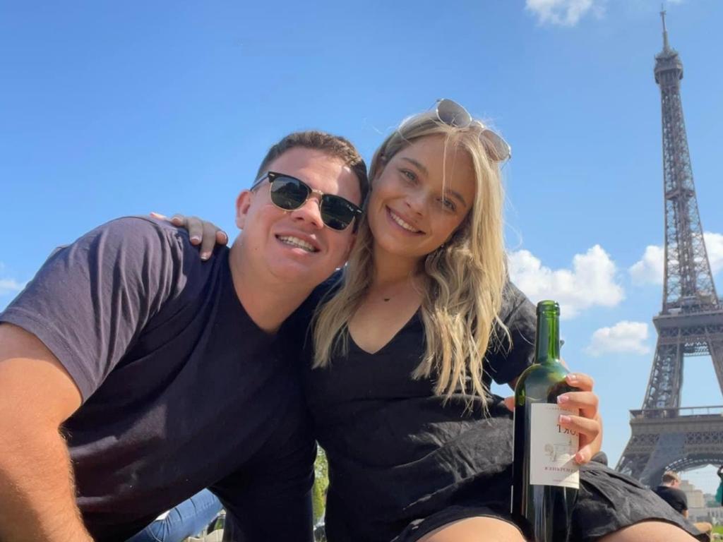 WARNING. WEEKEND TELEGRAPHS SPECIAL.  MUST TALK WITH PIC ED JEFF DARMANIN BEFORE PUBLISHING.     FOR ESCAPE HUB PROMO  Rhys Browne and his fiance Mykaela Wise  
Rhys Browne and Mykaela Wise enjoying a picnic in front of the Eiffel Tower in Paris.