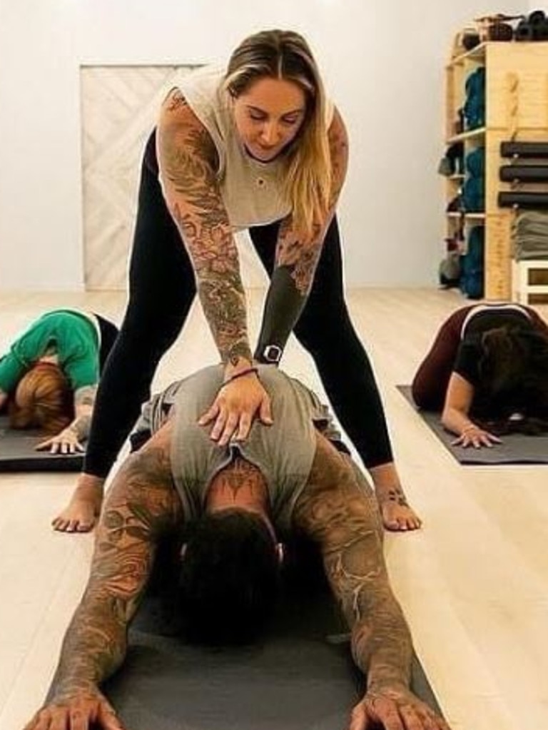 She loves teaching yoga. Picture: Instagram/badyogisociety