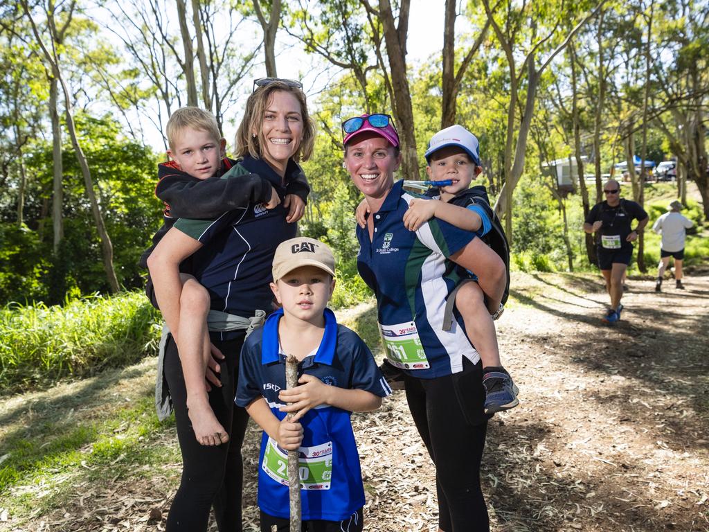 Members of team St Ursula's College Shelley Stokes (left) holding Finny Ruhle, Alfie Ruhle and Elyce Ruhle holding Felix Ruhle during Hike for the Homeless, Saturday, October 29, 2022. Picture: Kevin Farmer