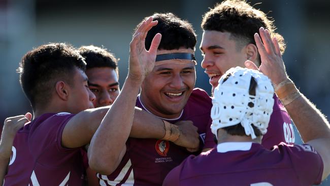 QLD's Arama Hau celebrates his try with teammates during the under 18 ASSRL schoolboy rugby league championship grand final between QLD v NSW CHS from Moreton Daily Stadium, Redcliffe. Picture: Zak Simmonds